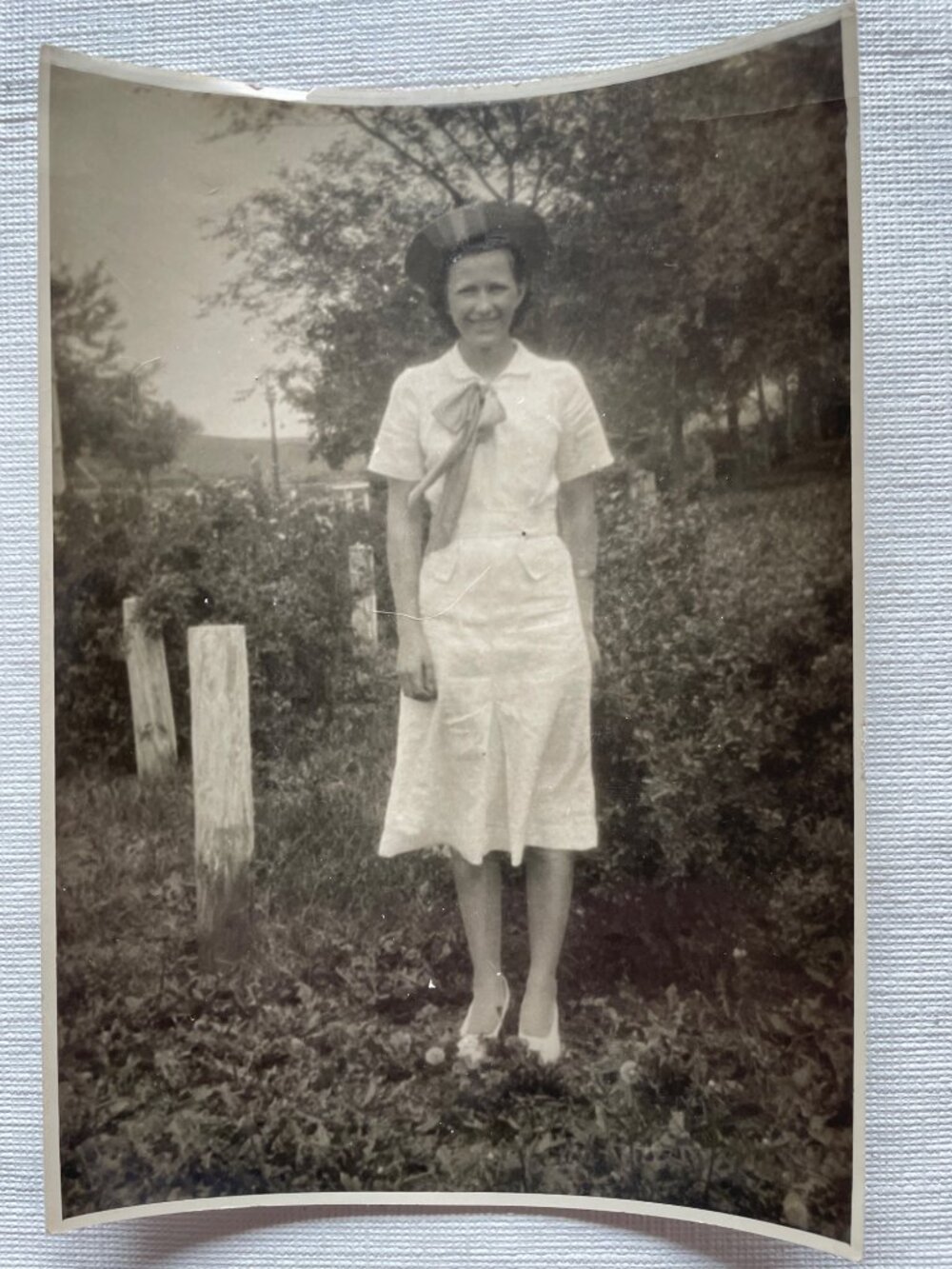 Vintage Woman in GraveYard 1940s Black & White smiling Photograph In Dress & Hat